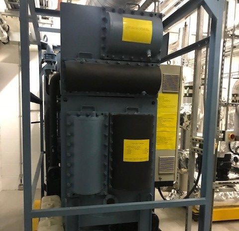 Green absorption chiller with black lagging for the cold parts of the system