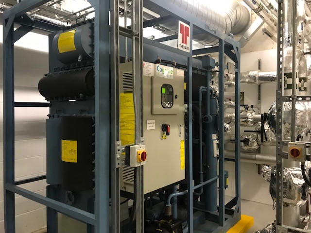 Absorption chiller service, maintenance and repair in plant room showing control panel