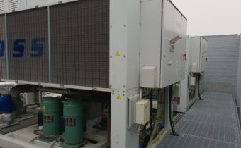 Glycol chiller maintenance of two white chillers with green compressors