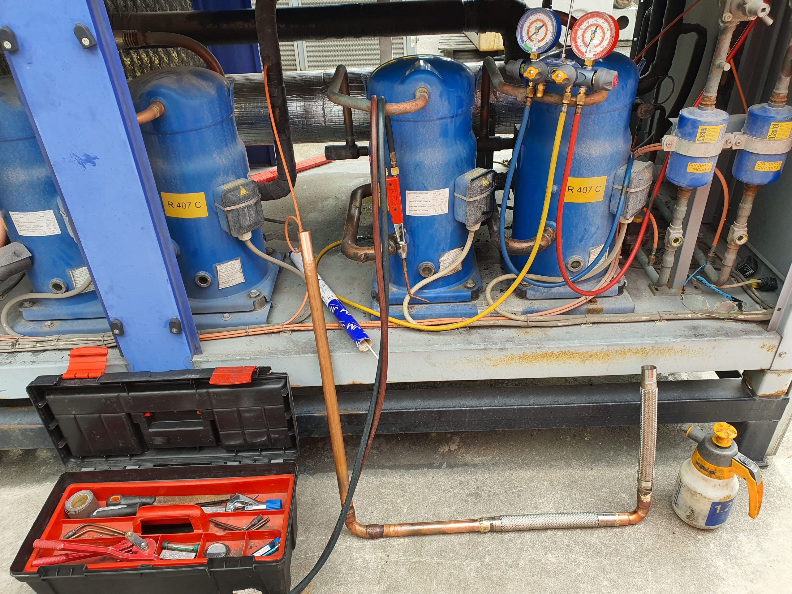 Brazing equipment box and vibration eliminators during packaged chiller service