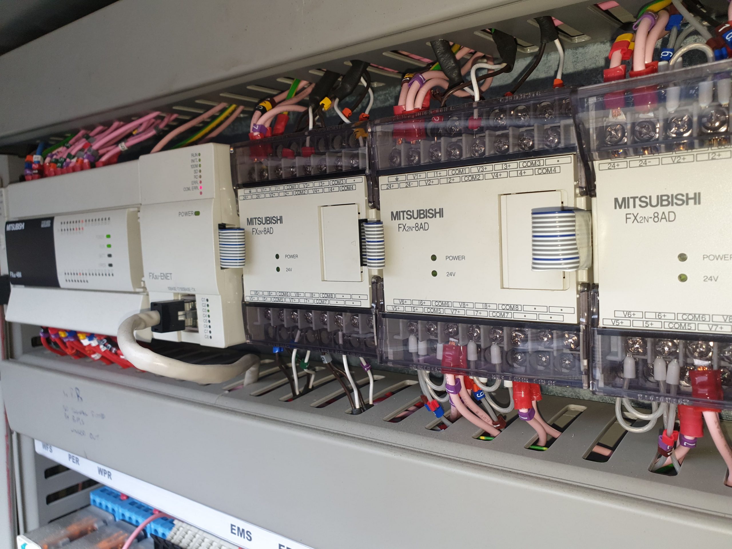PLC and relay board in a panel during chiller service company visit