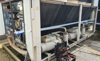 Large air cooled brown chiller with test equipment during planned preventative chiller maintenance