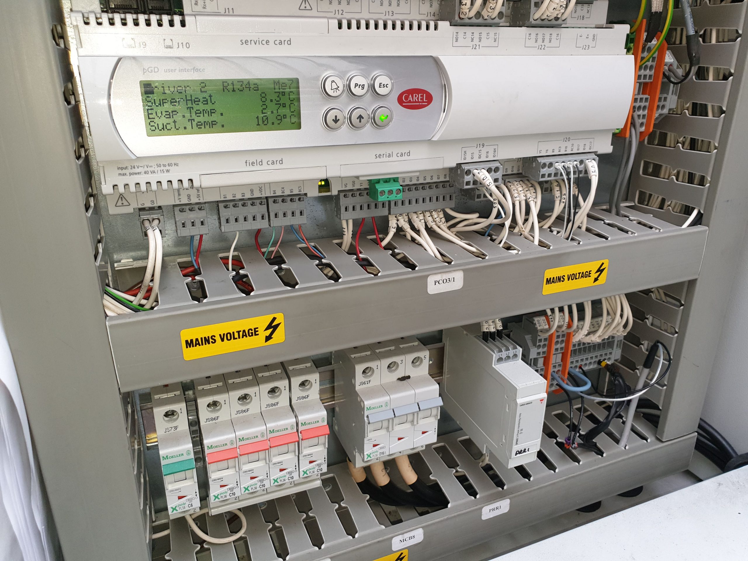 Carel controller showing R134a refrigerant readings during preventative chiller maintenance