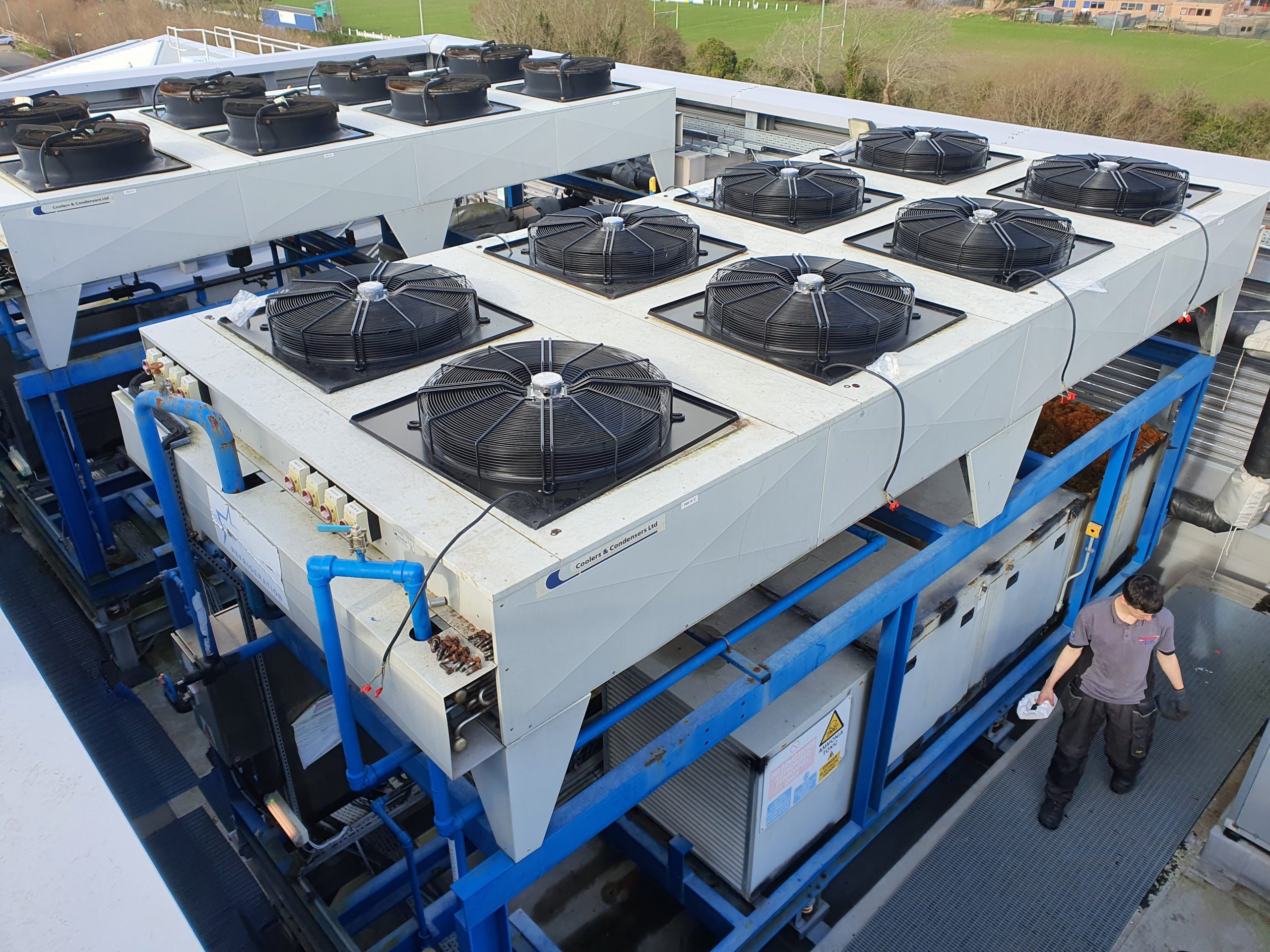 All new fan decks in place on large air cooled chiller during chiller repair service